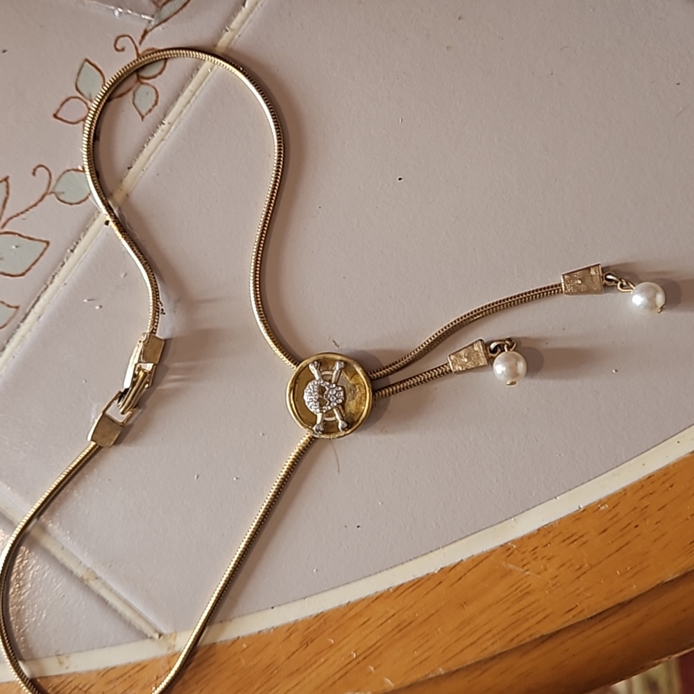 Rhinestones pearls and skulls Tie Necklace